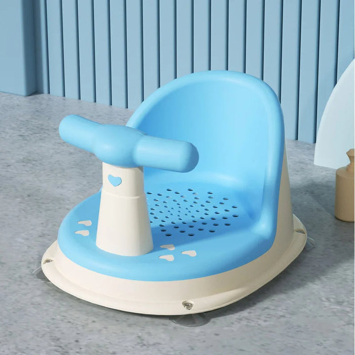 Green baby bath support seat, ideal for ages 6+ months, ensuring a secure and comfortable soak.