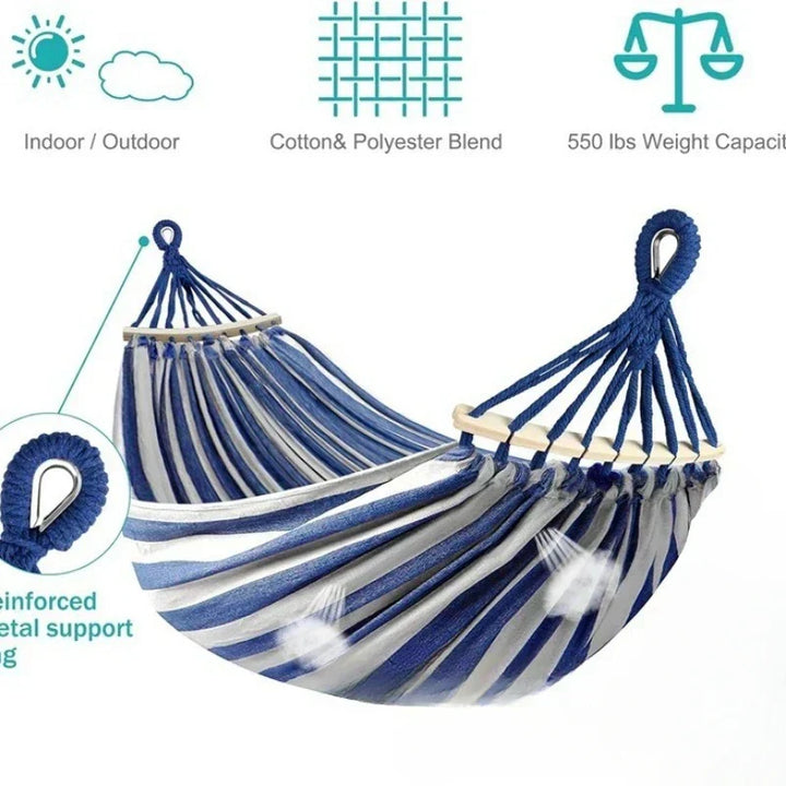 Unisex double canvas hammock, durable fabric & solid wooden spreader bars, great for garden or patio outdoor living.