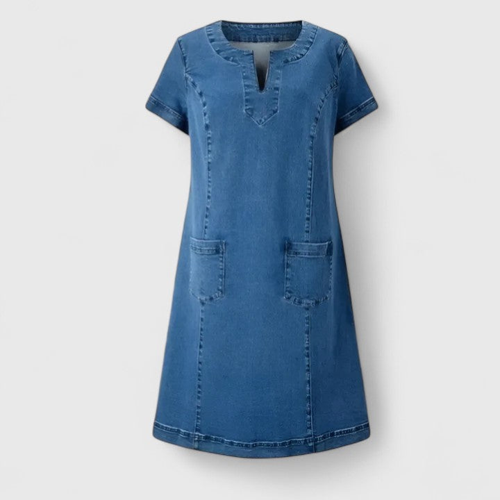 Comfortable blue flowy midi dress for women featuring practical pockets, ideal as a casual everyday summer dress.