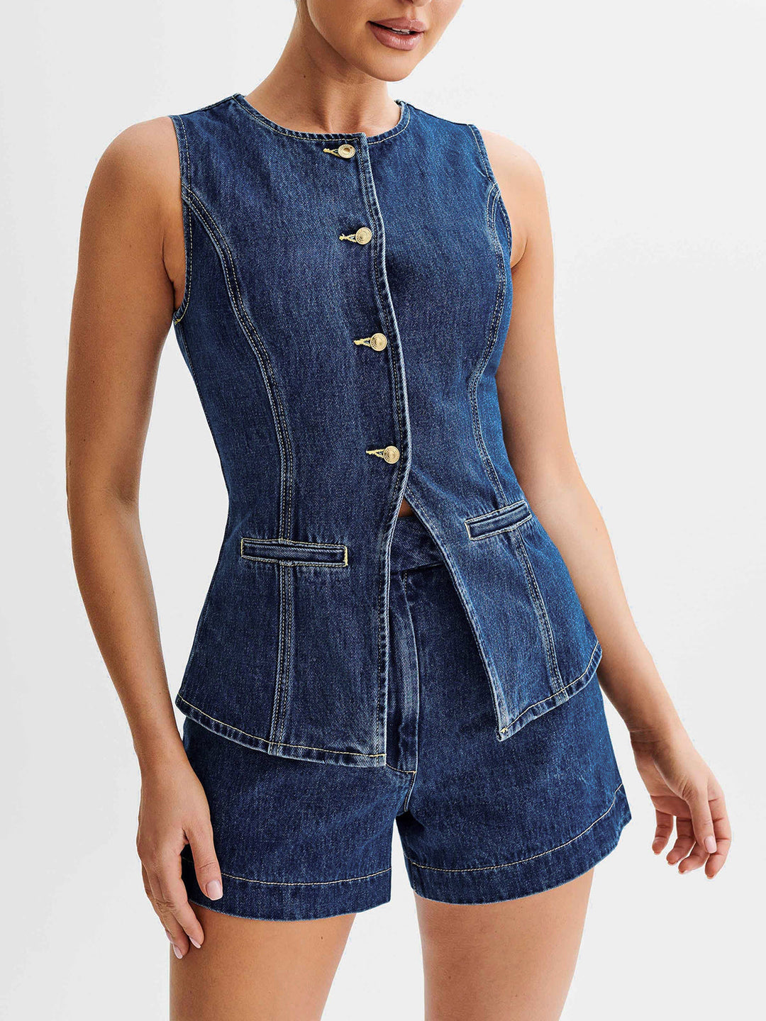 Chic blue women's two-piece outfit: sleeveless vest & matching shorts. Versatile for modern summer fashion.