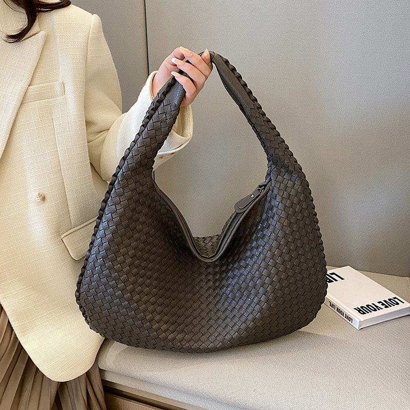 Bohemian braided leather hobo bag with intricate woven design