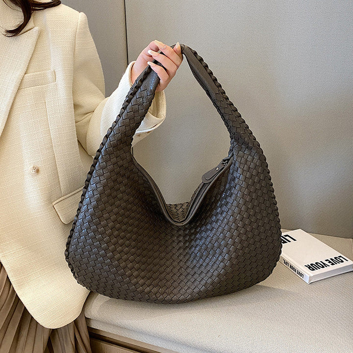 Bohemian braided leather hobo bag with intricate woven design