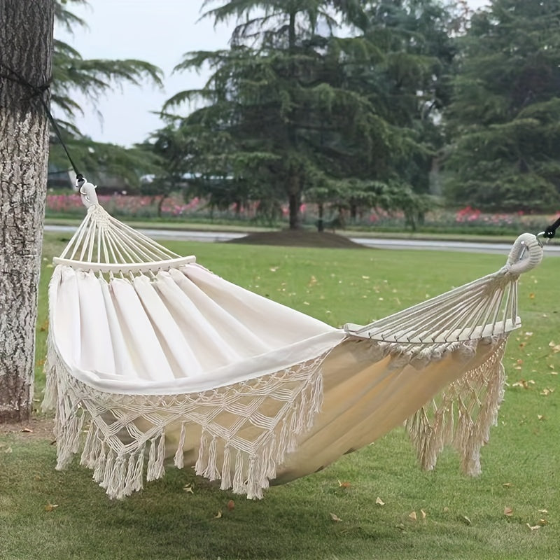 Comfortable double hammock, bohemian style, for cozy outdoor and indoor relaxation.