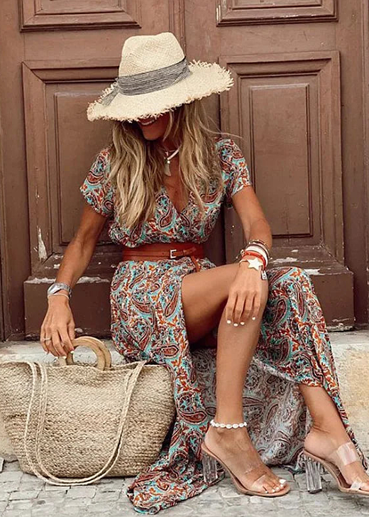 Elegant bohemian floral maxi dress for women. V-neck, short sleeve summer dress, ideal for vacation & beach.
