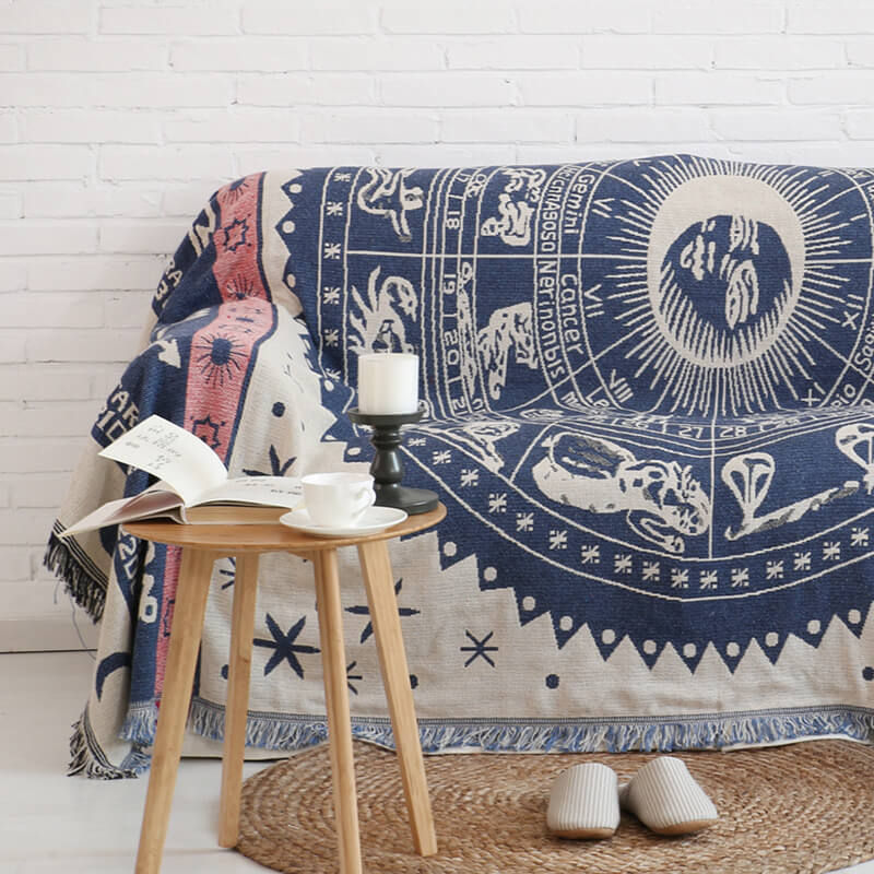 Decorative bohemian sofa throw blanket with stylish knitted texture and tassels.