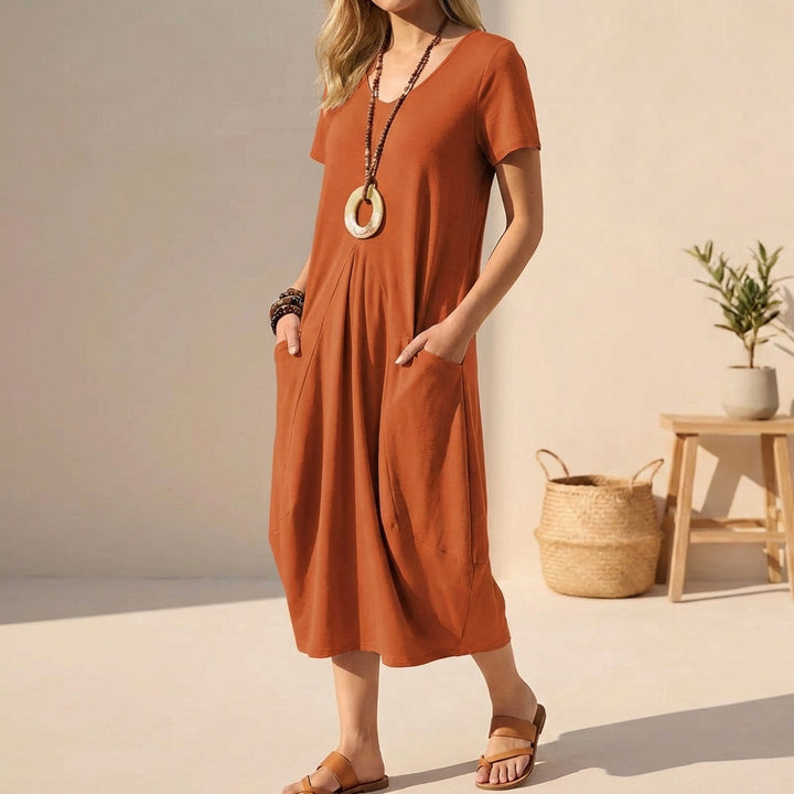 Chic and comfortable V-neck midi dress with short sleeves, perfect for daily outings.