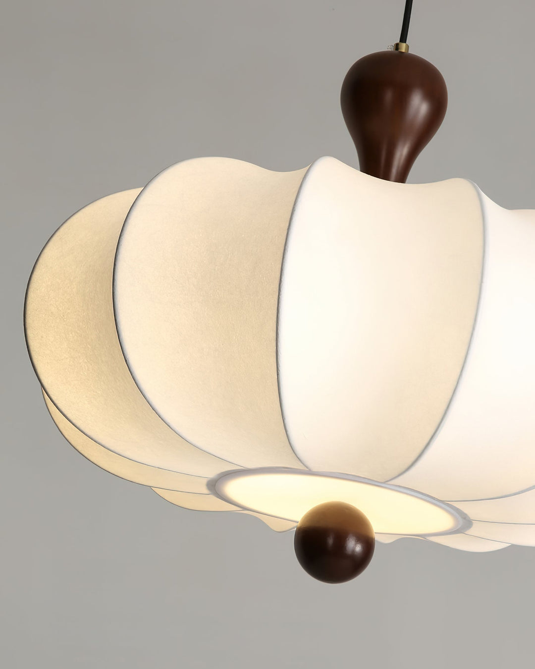 Adjustable Briael pendant light, modern walnut wood frame & white fabric shade, ideal for home lighting.