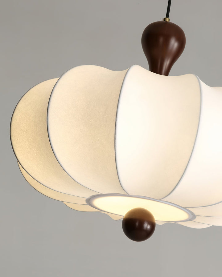 Adjustable Briael pendant light, modern walnut wood frame & white fabric shade, ideal for home lighting.