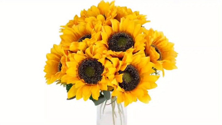 Vibrant artificial sunflowers, a cheerful addition to autumn bouquets and wedding decorations.