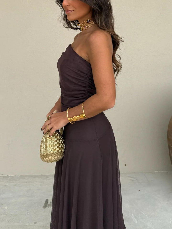 Fashionable brown off-shoulder maxi dress, elegant mesh overlay. Ideal formal evening gown for wedding guests & parties.