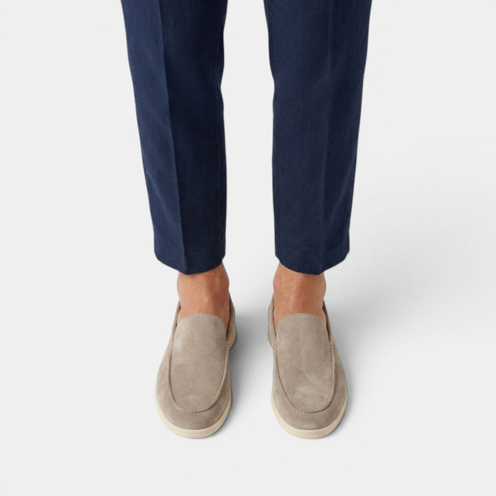Stylish navy blue suede slip-on loafers, perfect for modern casual & smart looks.