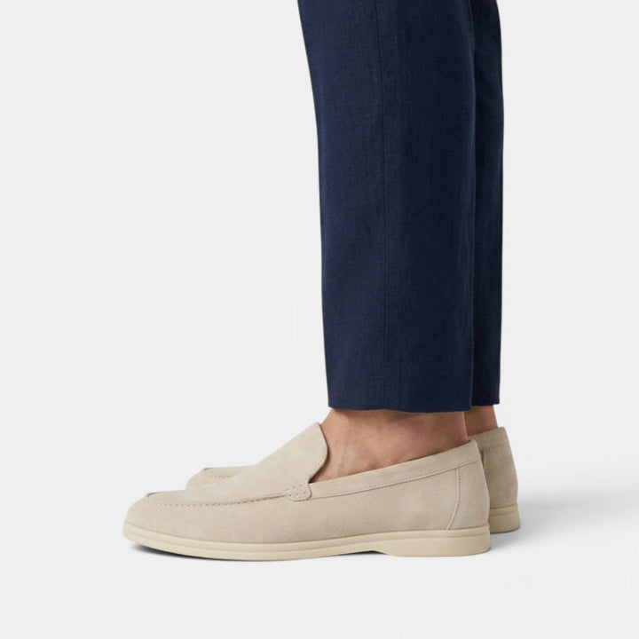 Black sophisticated slip-on loafers, versatile men's dress shoes for smart looks.