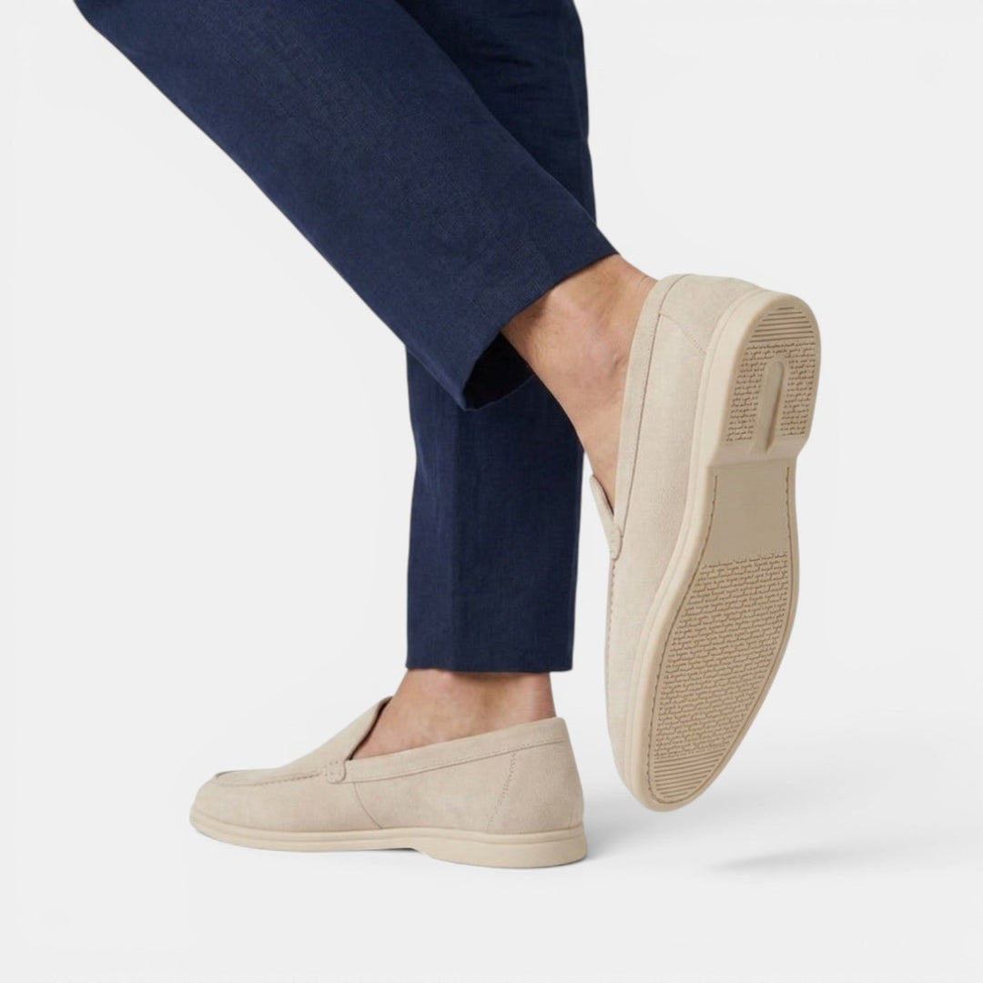 Smart grey slip-on loafers, versatile men's shoes for casual and dressy looks.