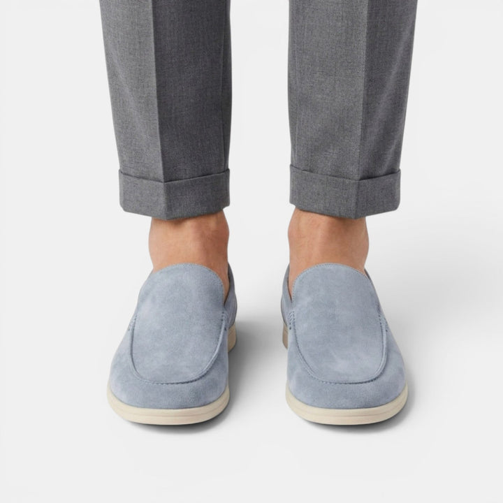 Modern black slip-on loafers for men, easy wear dress shoes & casual footwear.