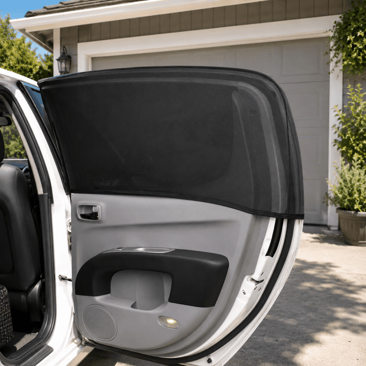 Car window mesh cover for rear windows, providing excellent airflow and insect protection for comfortable travel.