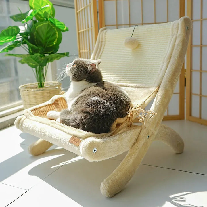 Modern cat bed with scratching surface. Deckchair lounger offers a comfy spot for cats to sleep and scratch.