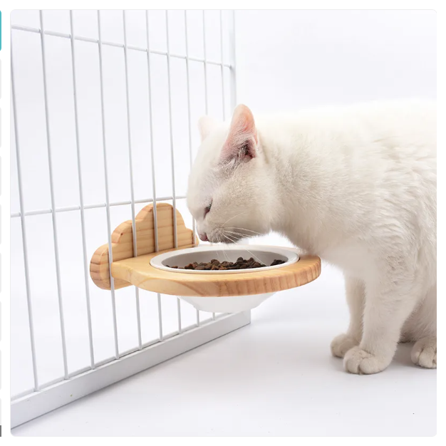 Cat wall-mounted food bowl with cloud wood frame, providing elevated, comfortable eating for pets.
