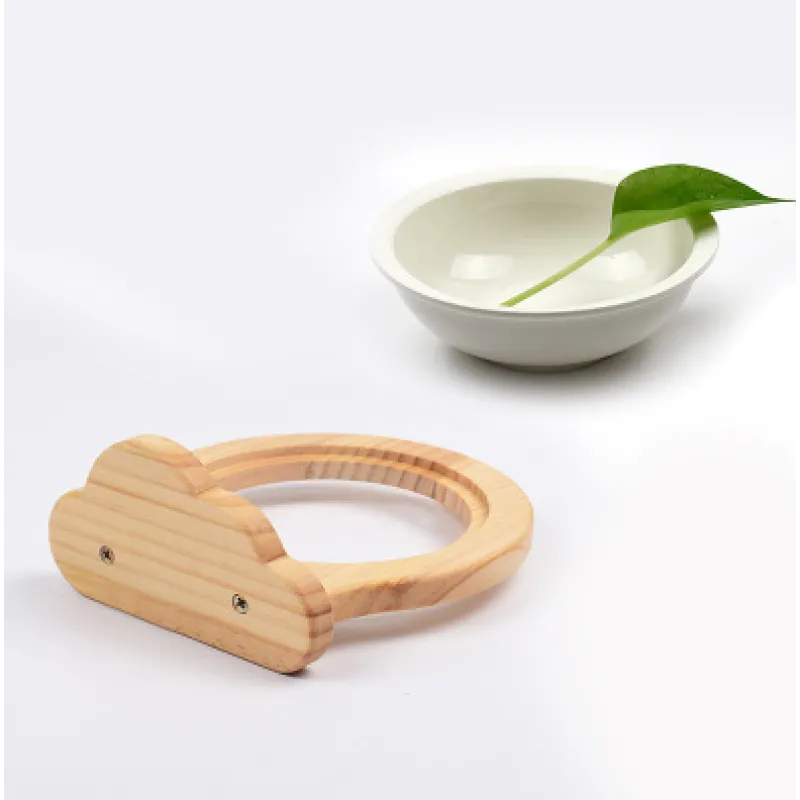 Modern wall-mounted cat food bowl with cloud wood frame. An elevated feeder for comfortable and stylish pet care.