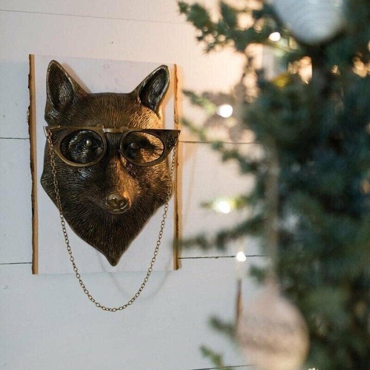 Artistic owl resin wall decor, charming accent piece for home office or study.