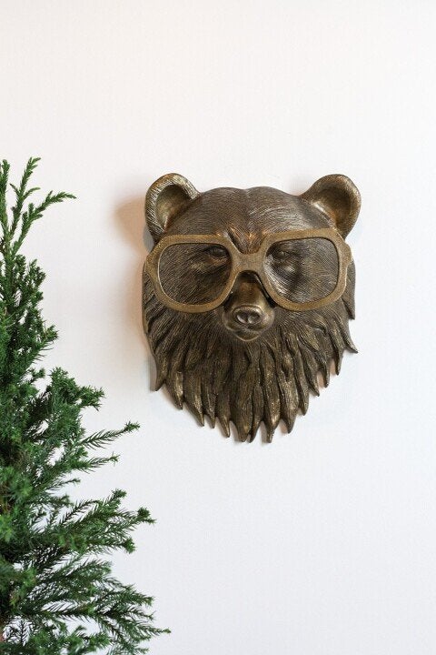 Decorative resin creature wall hanging, modern design for interior spaces.