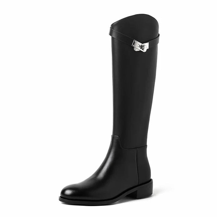 Elegant black leather knee-high boots, ideal for chic winter and fall outfits.