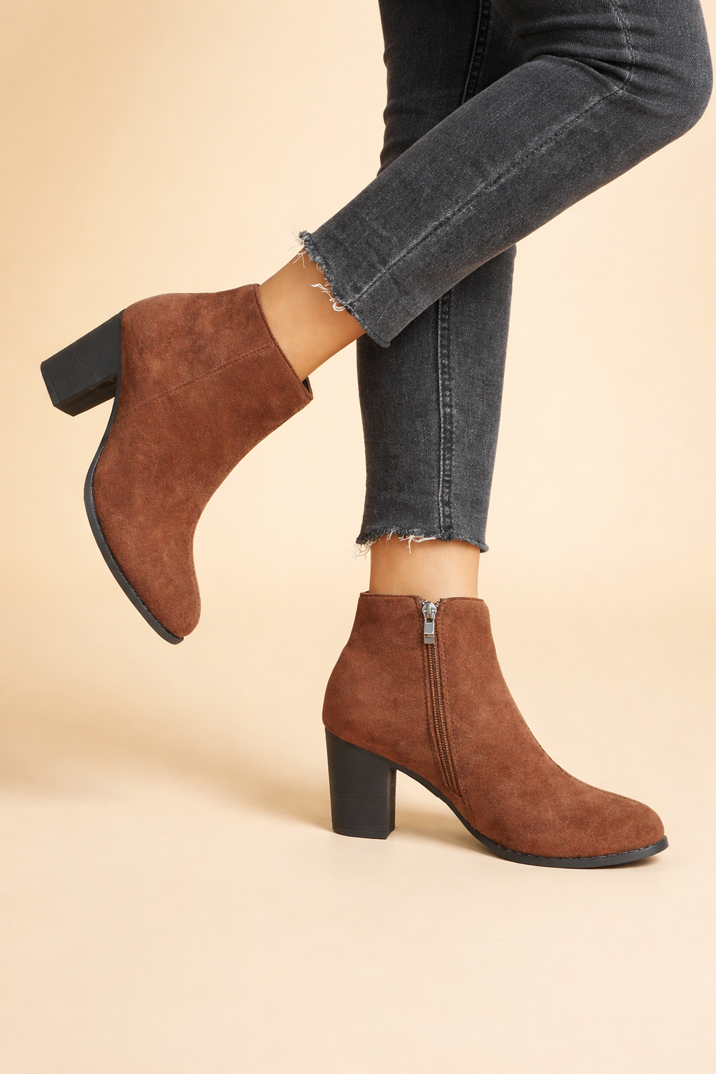Chic brown women's ankle boots with comfortable block heel & side zip. Ideal everyday fall/winter fashion.