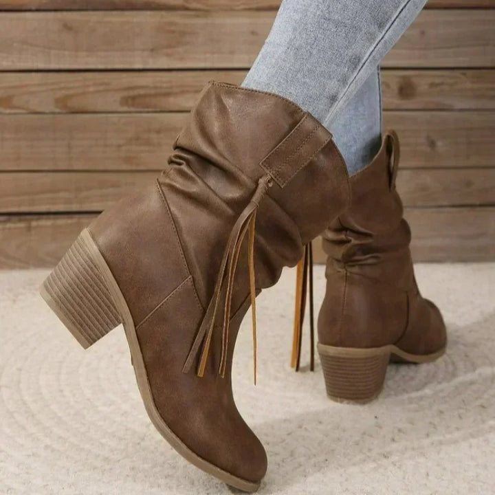Comfortable & chic women's western ankle boots in brown, featuring stylish tassels for versatile fashion.