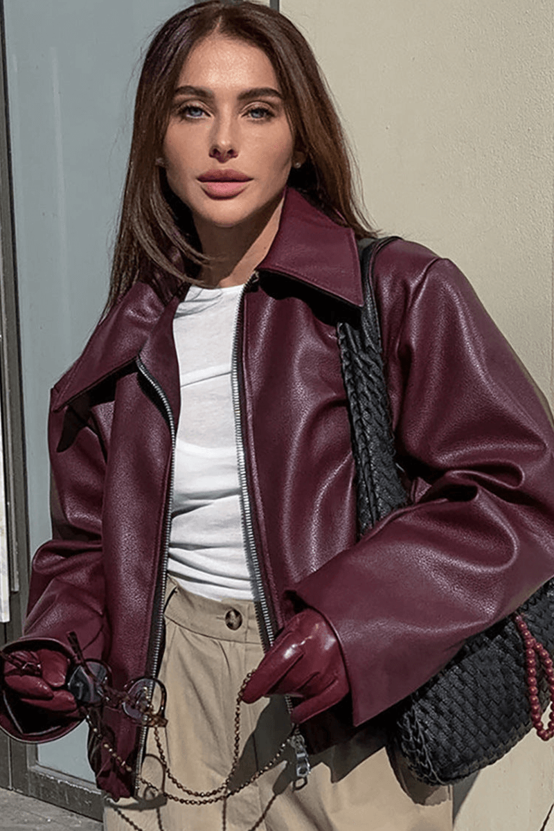 Chic burgundy cropped jacket for women, a stylish and modern piece of ladies' apparel.