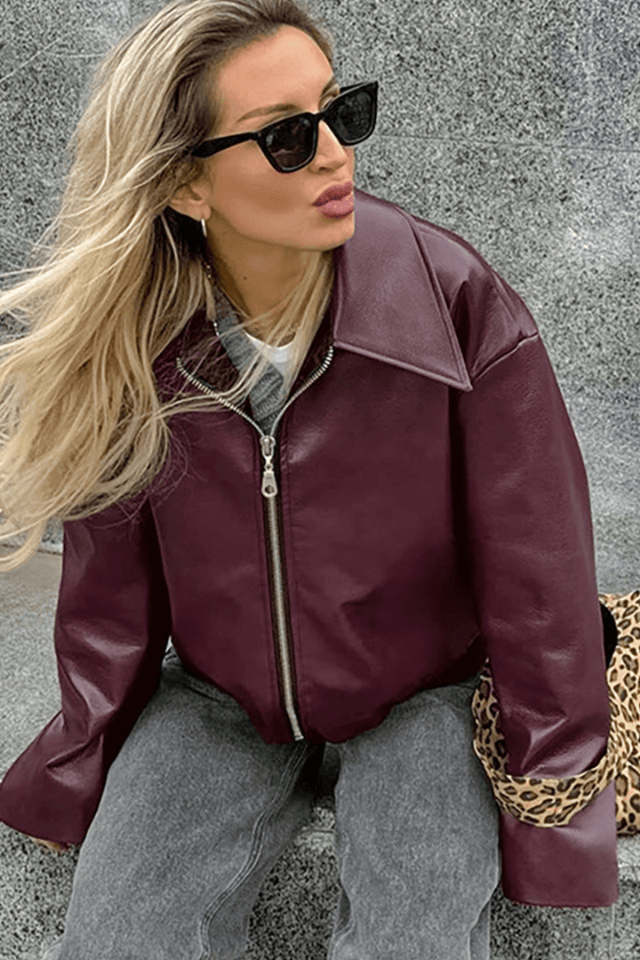 Versatile women's burgundy cropped jacket, a chic and trendy piece of red outerwear.