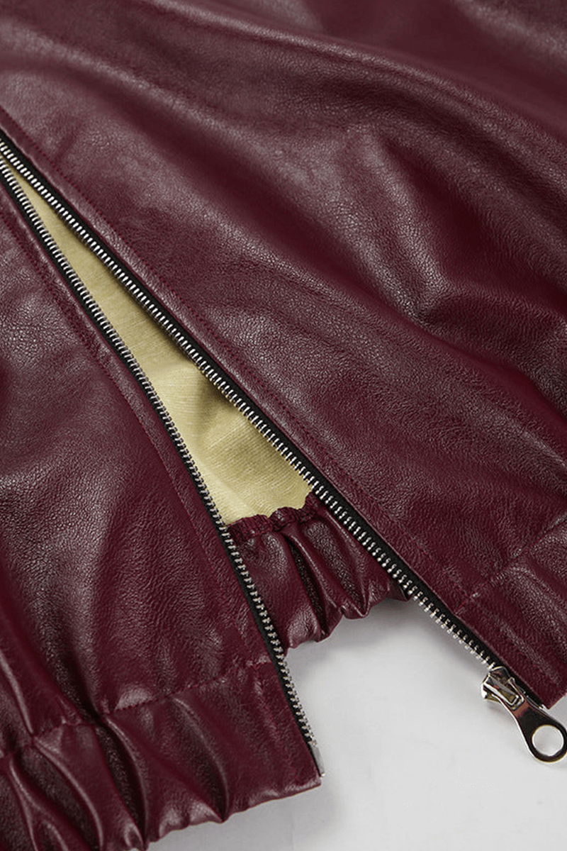 Woman enjoying her casual chic burgundy cropped jacket, perfect for trendy fashion.