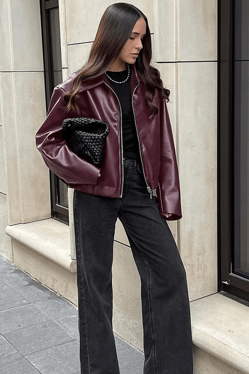 Back of a women's burgundy cropped jacket, a stylish red outerwear piece for any lady.