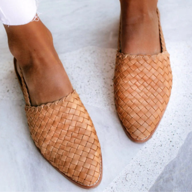 Stylish handwoven women's sandals, offering chic summer footwear with ergonomic comfort design.