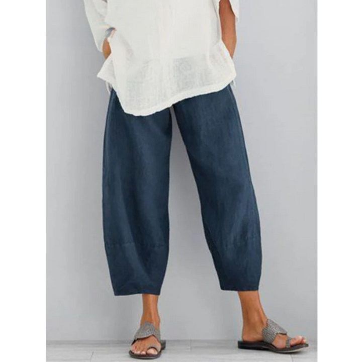 Blue all-season linen pants, chic and comfortable trousers ideal for effortless everyday wear.