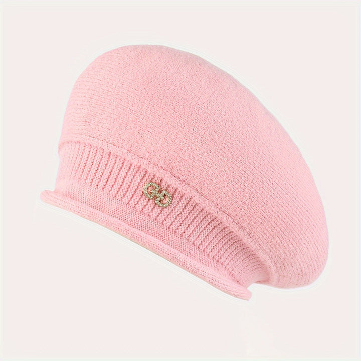 Soft knit women's beret, a fashionable and comfortable headwear for cold weather.