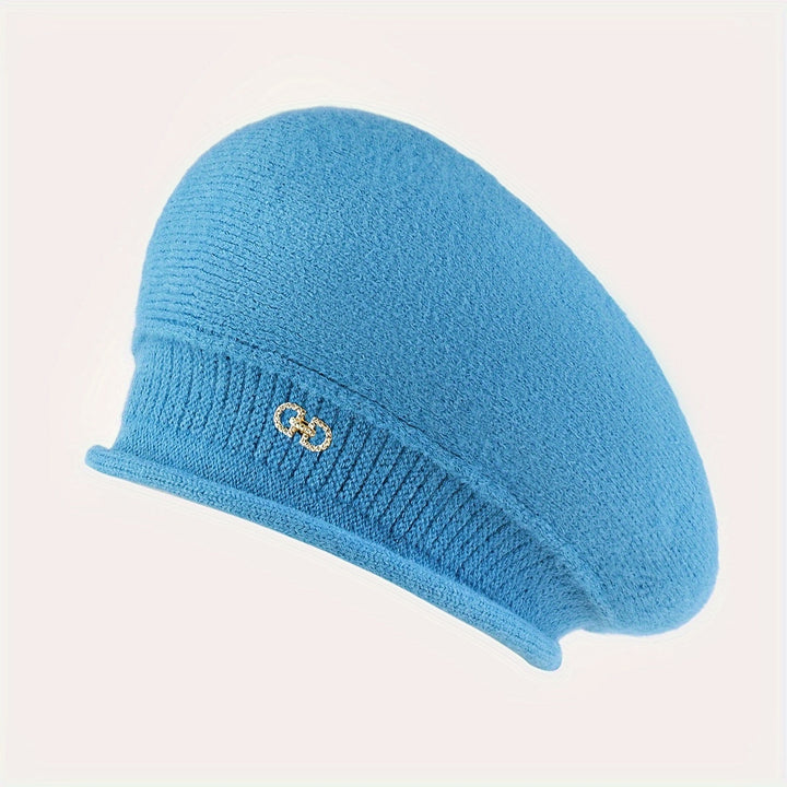 Beautifully knitted women's beret, enhancing winter style with its chic appeal.