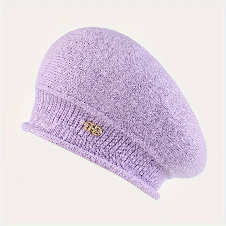 A sophisticated women's beret, knitted for warmth and elegant winter fashion.