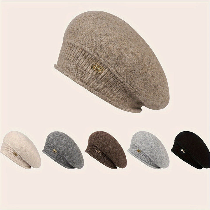 Soft knitted women's beret, a classic and fashionable winter hat for ladies.