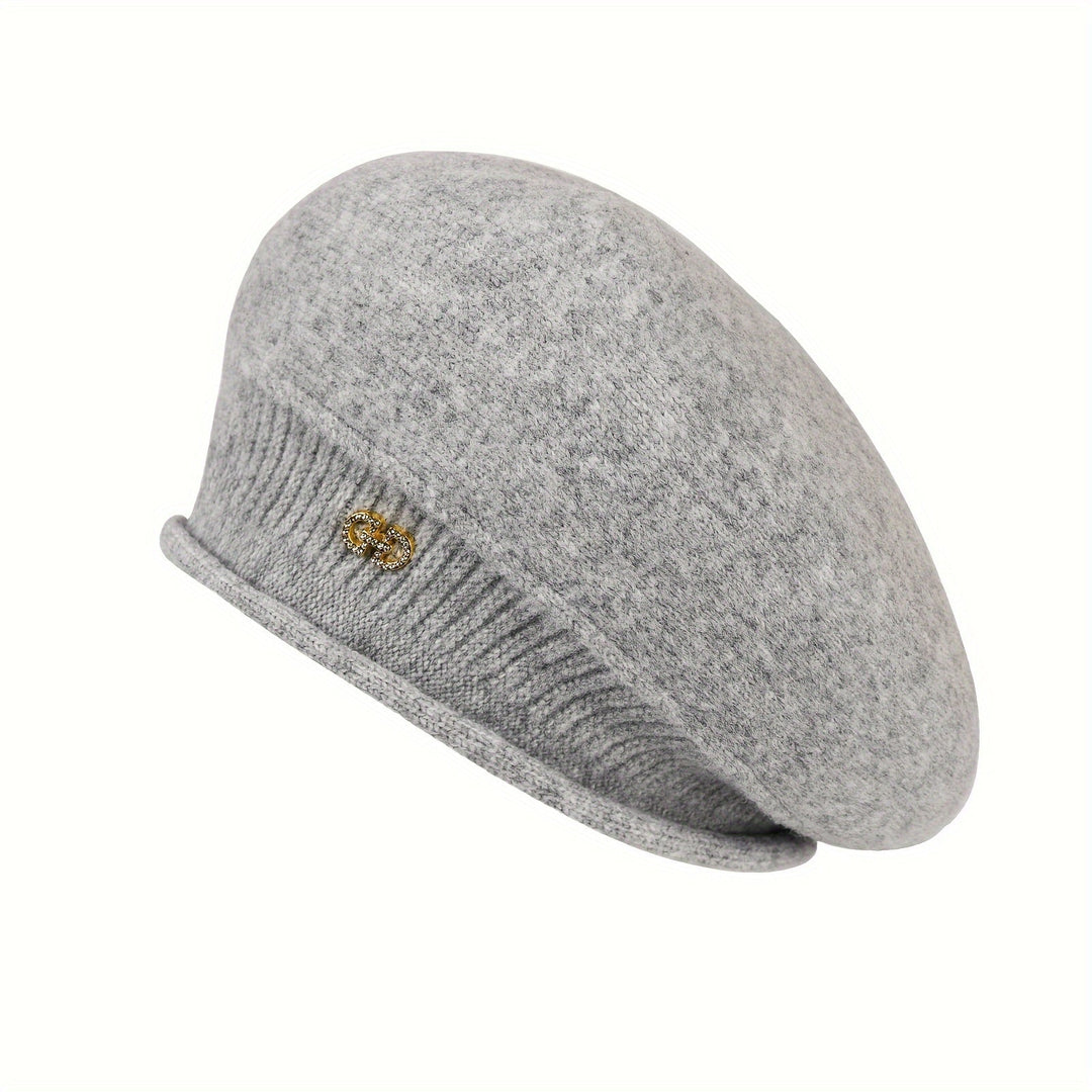 Elegant women's beret, finely knitted for warmth and chic winter style.