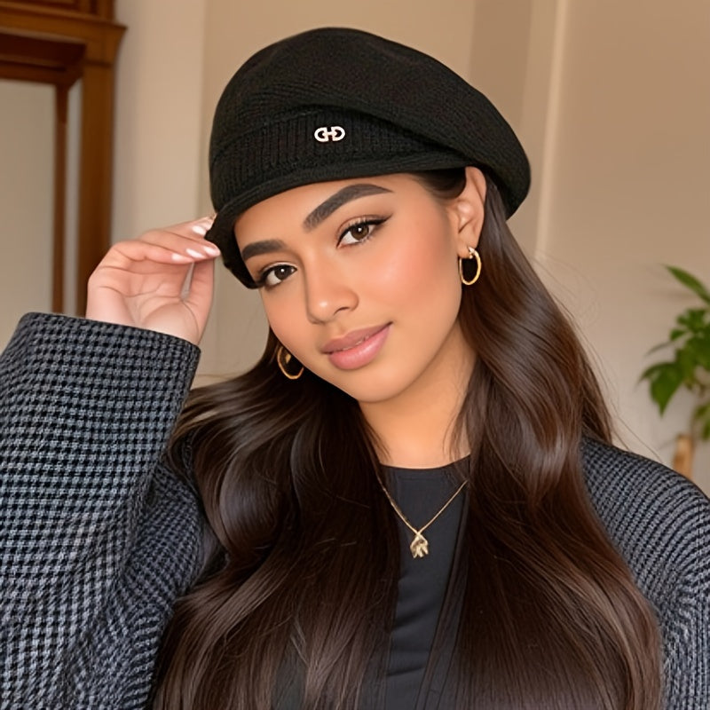 Warm knitted beret for women, a stylish headwear perfect for cold seasons.