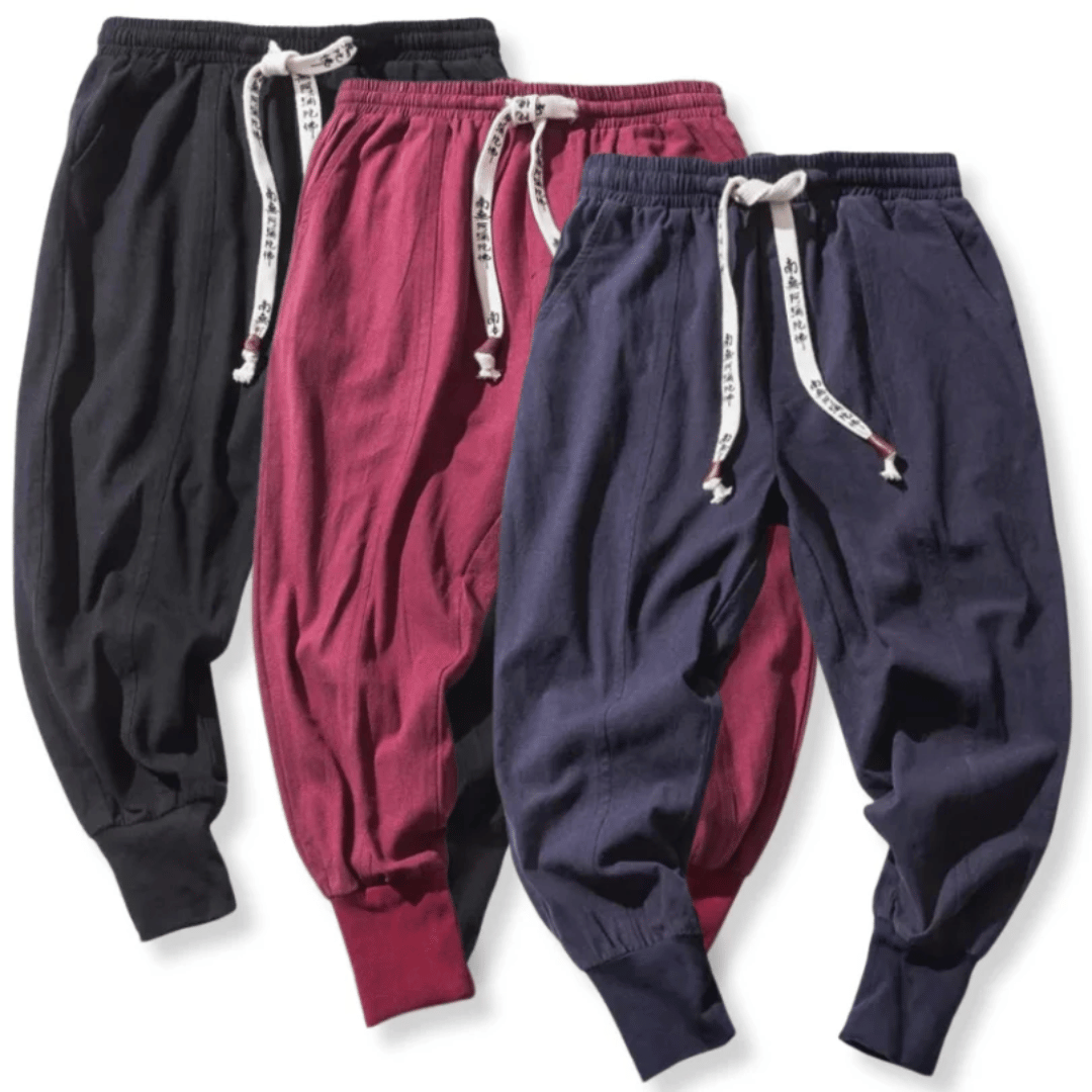 Modern black tapered pants offering a relaxed Japanese fit.