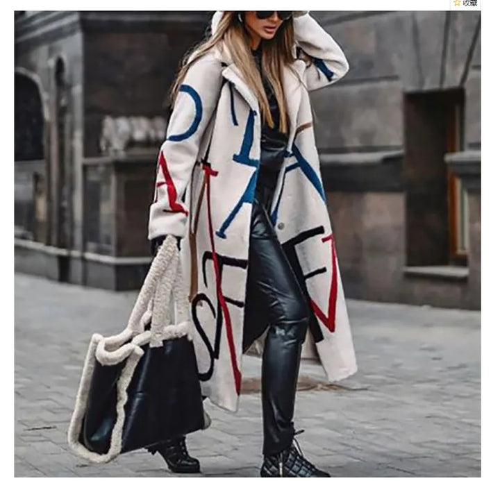 Back view of the women's oversized coat, highlighting its silhouette.