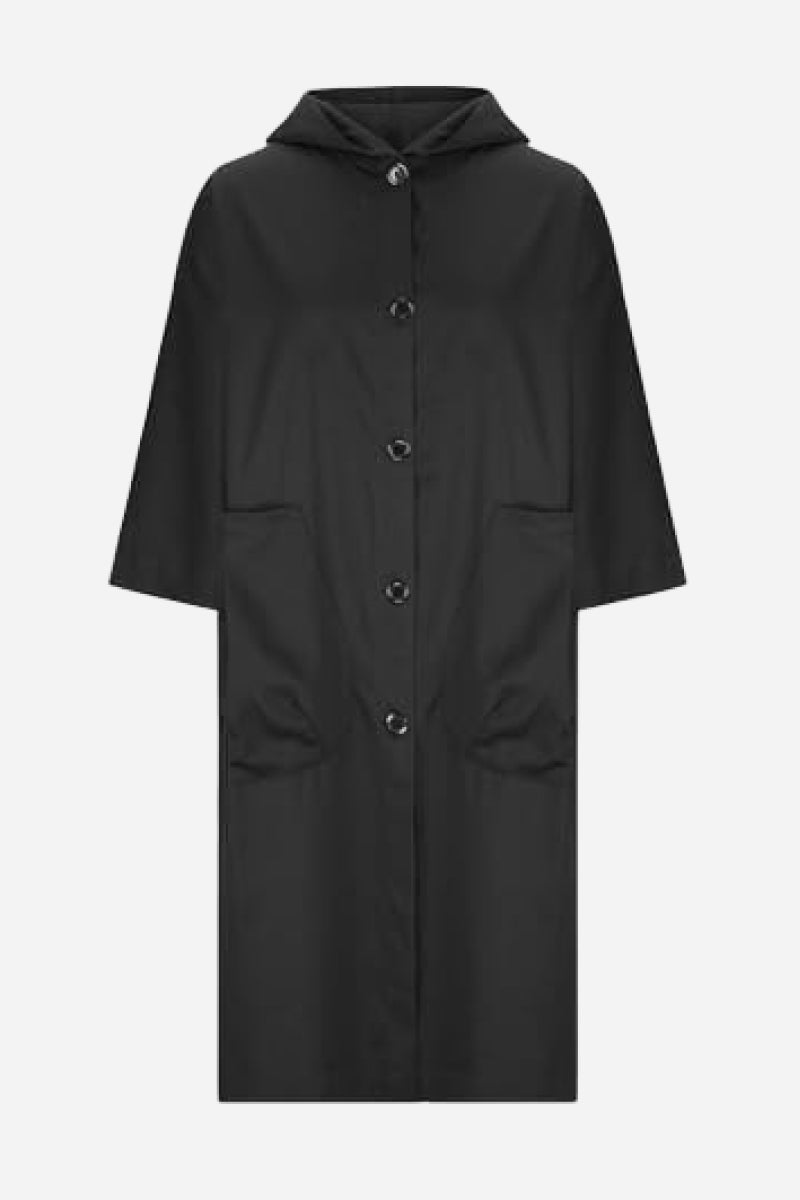 Lightweight women's waterproof windbreaker, easily packable oversized rain jacket for travel.