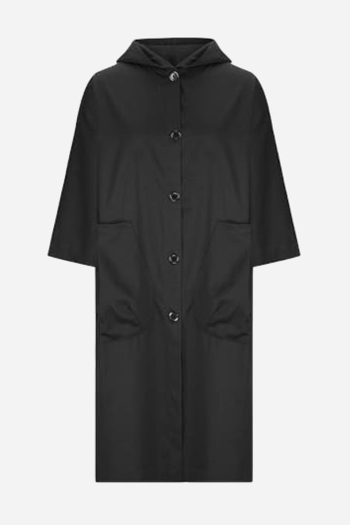 Lightweight women's waterproof windbreaker, easily packable oversized rain jacket for travel.