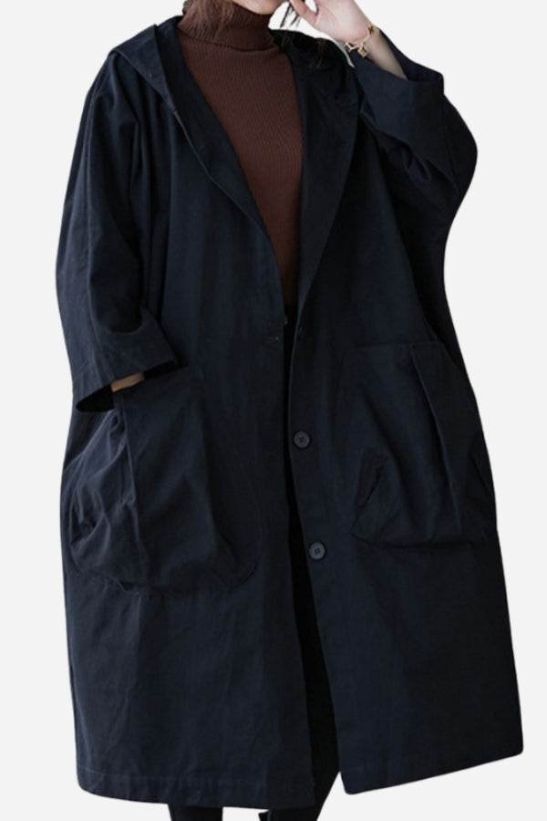 Women's oversized waterproof windbreaker jacket, perfect lightweight outerwear for crisp fall days.