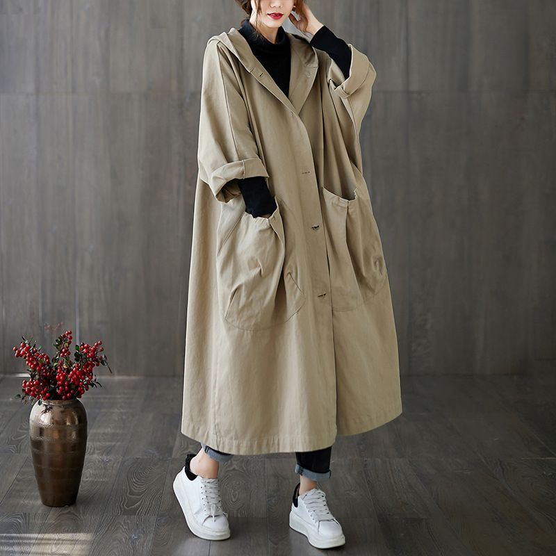 Women's stylish oversized rain jacket, a lightweight waterproof windbreaker for spring showers.