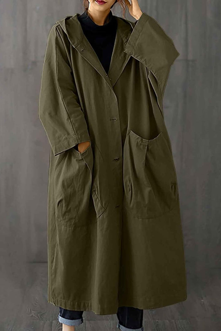 Chic women's oversized windbreaker, a stylish waterproof jacket for versatile spring & fall fashion.