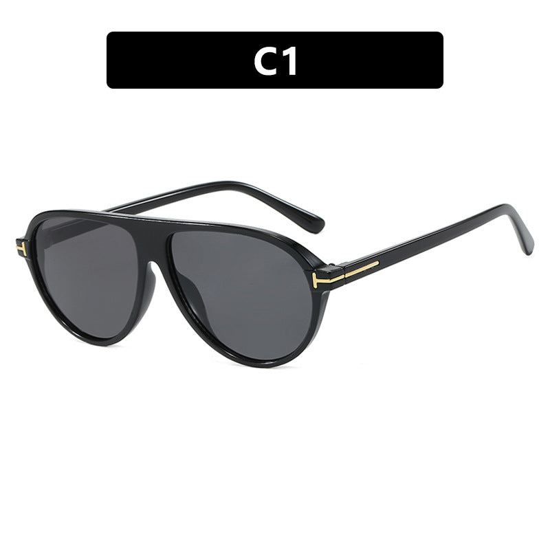Chic oversized women's sunglasses with UV protection, stylish metal frame, perfect fashion eyewear.
