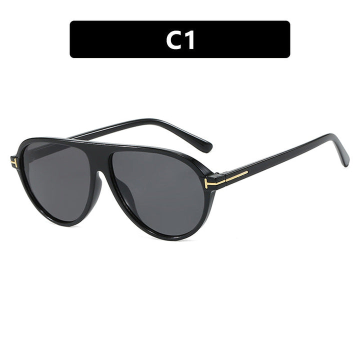 Chic oversized women's sunglasses with UV protection, stylish metal frame, perfect fashion eyewear.