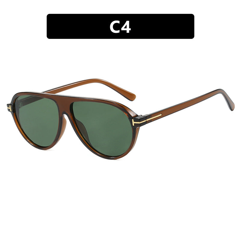 Fashionable women's oversized sunglasses, sleek metal frame design for a chic look. UV protective eyewear.