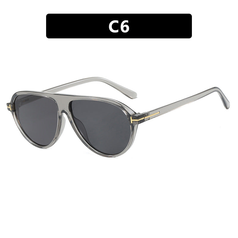 Elegant women's oversized sunglasses, featuring a durable metal frame and superior UV protection for outdoor style.